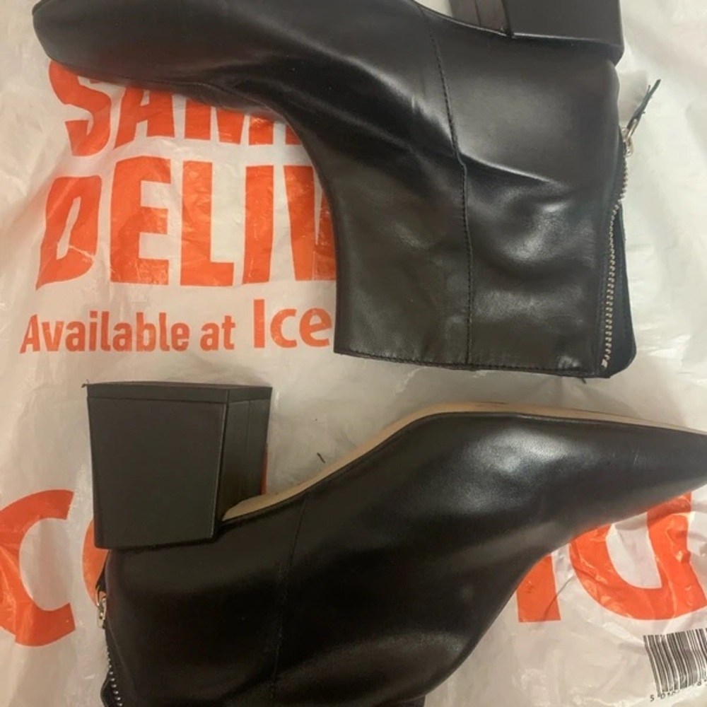 Chic Black Leather Heeled Boots